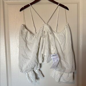 Elegant White Strappy Blouse with Ruffle Details